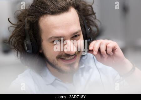 male call centre operator doing his job Stock Photo