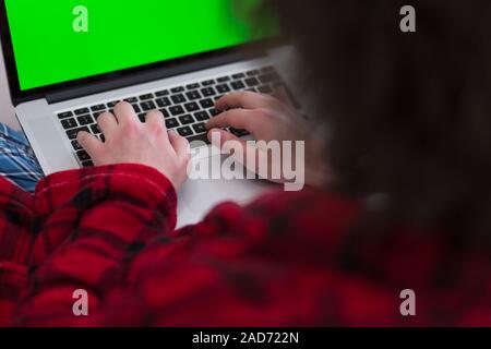 man freelancer in bathrobe working from home Stock Photo
