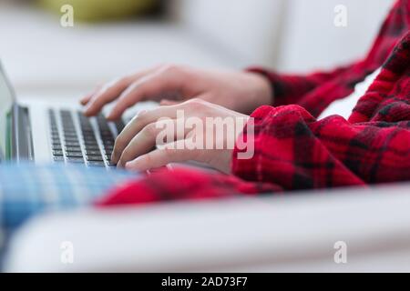 man freelancer in bathrobe working from home Stock Photo