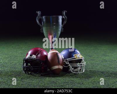 closeup of american football,helmets and trophy Stock Photo