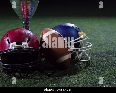 closeup of american football,helmets and trophy Stock Photo