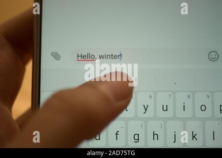 Female hand typing on smartphone with SUBSCRIBE inscription, social ...