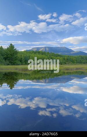 Katahdin with some beautiful late-day clouds and reflections. Stock Photo