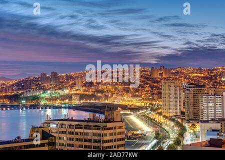 The bay of Valparaiso in Chile at dusk Stock Photo