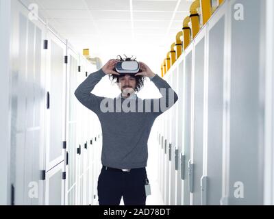 IT engeneer using virtual reality headset Stock Photo