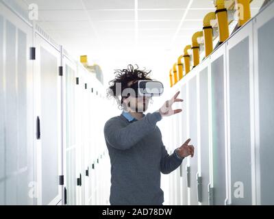 IT engeneer using virtual reality headset Stock Photo
