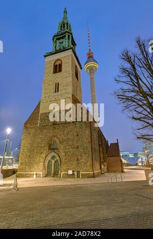 St. Marys Church and the famous Television tower in Berlin at dawn Stock Photo