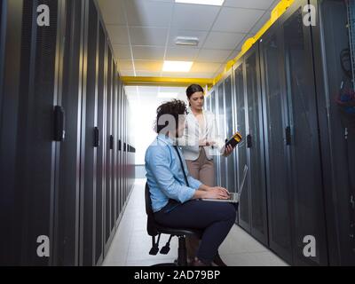 technicians working together on servers Stock Photo