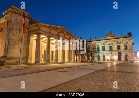 The Neue Wache and the German Historical Museum in Berlin at night Stock Photo