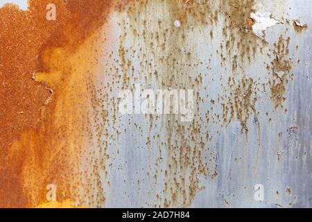 Rusty metal with chipped paint as background Stock Photo
