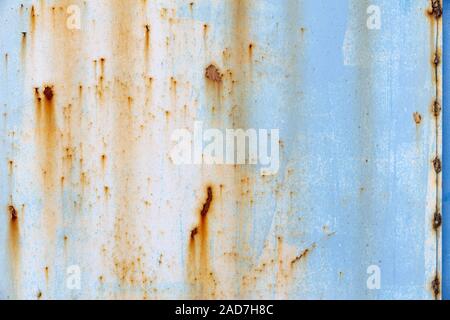 Rusty metal with chipped paint as background Stock Photo