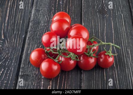 Two branches of cherry tomatoes Stock Photo