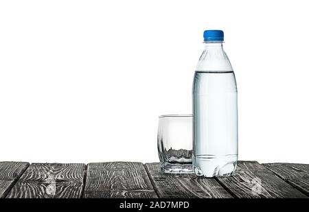 Empty glass and bottle of water Stock Photo