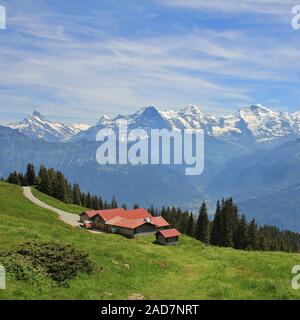 Snow capped mountains Eiger, Monch and Jungfrau, view from Mount Niederhorn. Bernese Oberland, Switz Stock Photo