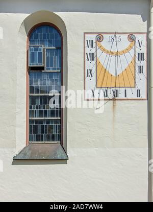 Church window and sundial,  Sankt Gallus,  Glatt, part of Sulz am Neckar, Black Forest Stock Photo