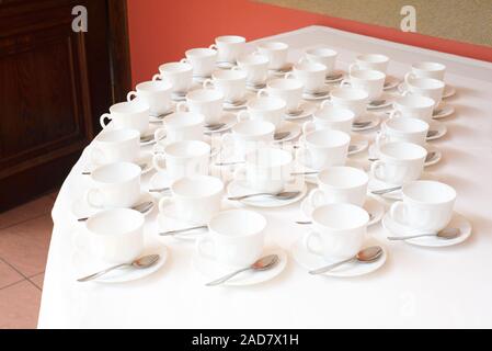 Group of white coffee cups in cafe bar Stock Photo