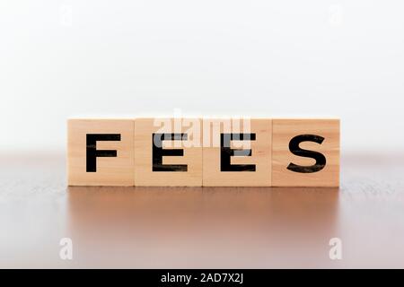 Fees word written on wooden cubes Stock Photo