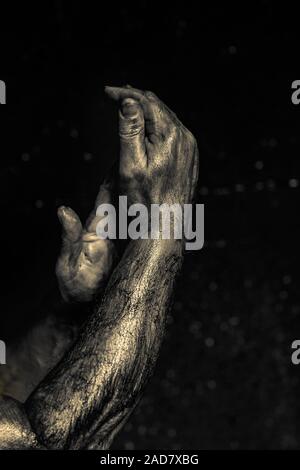 Close-up of a mans arm. Low key shoot. Stock Photo