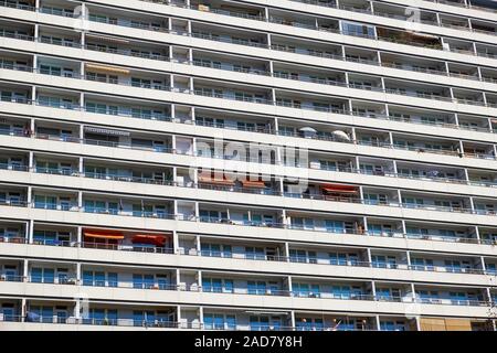Balconies of a prefabricated public housing building seen in Berlin, Germany Stock Photo