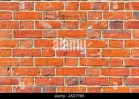 Background from a well saturated orange brickwall Stock Photo