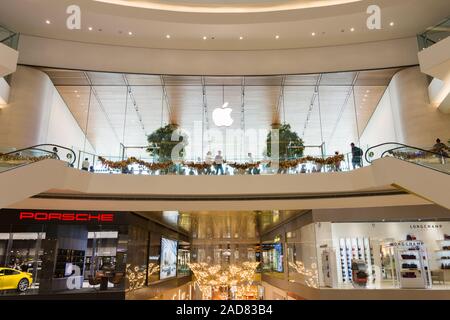 Bangkok,Thailand - October 31,2019 : The new Apple Store located inside Iconsiam shopping malls, people can seen exploring and shopping in the store. Stock Photo
