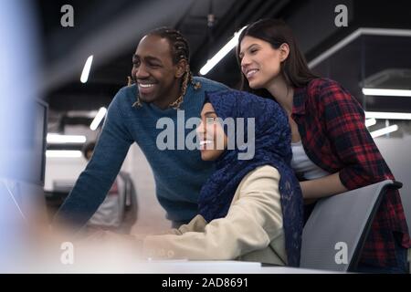 multiethnics team of software developers working together Stock Photo