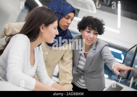 multiethnics team of software developers working together Stock Photo