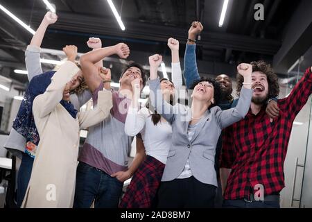 portrait of young excited multiethnics Business team Stock Photo