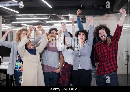 portrait of young excited multiethnics Business team Stock Photo