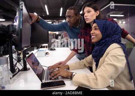 multiethnics team of software developers working together Stock Photo