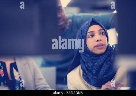 black muslim female software developer at work Stock Photo