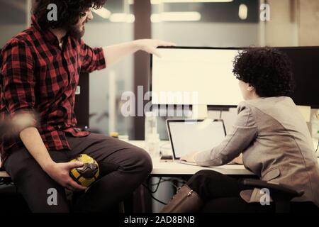 software developers couple writing programming code Stock Photo