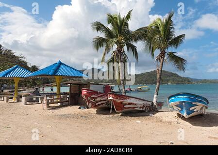 boats at the caribbean beach in puerto lindo panama Stock Photo