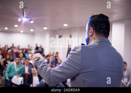 successful Businessman giving presentations at conference room Stock Photo