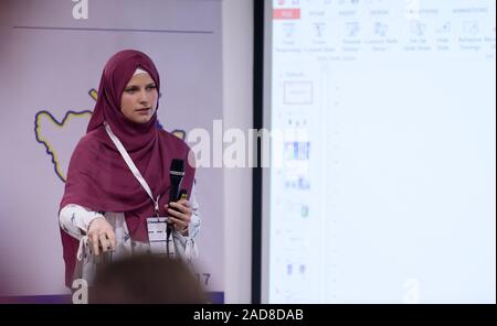 Muslim Businesswoman giving presentations Stock Photo