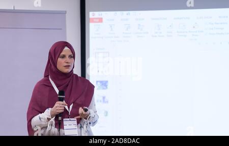 Muslim Businesswoman giving presentations Stock Photo