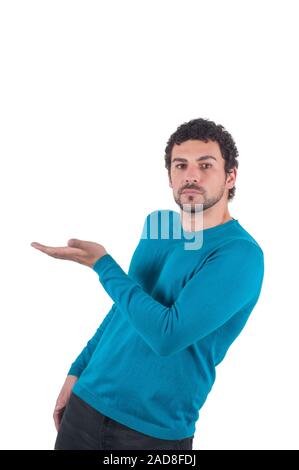 Guy in blue pointing to somewhere, isolated on white Stock Photo