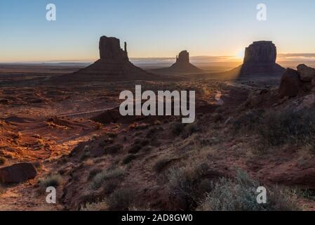 Monument Valley gets lighted by the morning sunbeams, Arizona, US Stock Photo