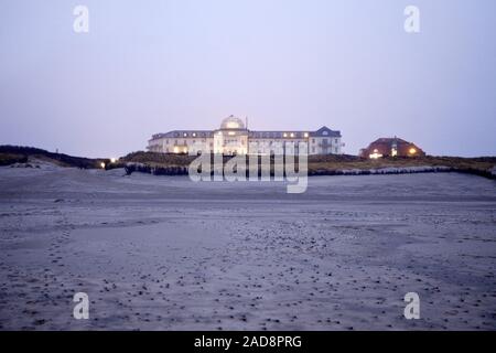 Wadden Sea and Spa Hotel at dusk, island Juist, East Frisia, Lower Saxony, Germany, Europe Stock Photo