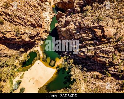 Ellery Creek Big Hole and surrounds in the West MacDonnell Ranges in the remote Northern Territory of central Australia Stock Photo