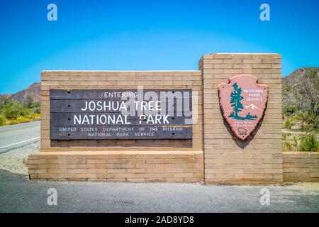 An entrance road going to Joshua Tree National Park Stock Photo