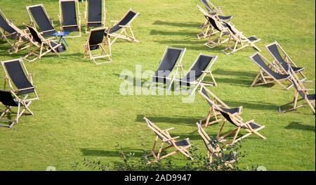 Sun loungers are placed on the lawn Stock Photo