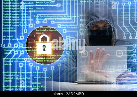 Young hacker in cybersecurty concept Stock Photo