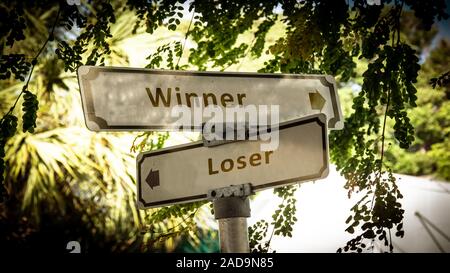 Street Sign to Winner versus Loser Stock Photo