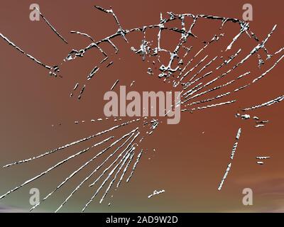 Rockfall in glass pane Stock Photo