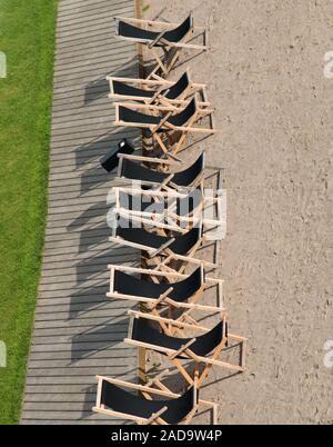 Sun loungers are placed on the lawn Stock Photo