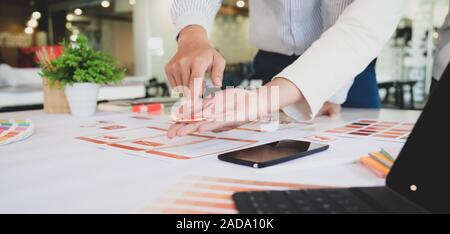 Cropped shot of successful UX graphic designer discussing on smartphone template project Stock Photo
