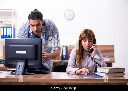 Young male it specialist in the office Stock Photo