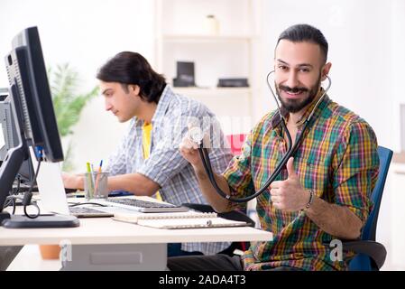 IT engineers working on hardware issue Stock Photo