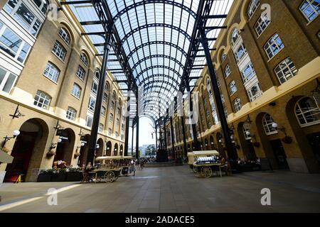 Hay's Galleria is an old warehouse converted to a modern shopping and office complex near the river Thames in London, England. Stock Photo